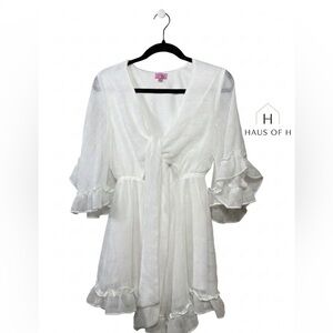 Mi Ami Woman’s. Sheer Stylish white romper size small with a tie-front detail.